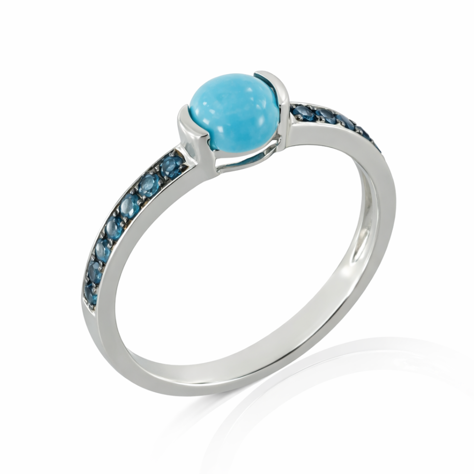 טבעת טוקריז ולונדון בלו טופז זהב לבן 14 קראט. מבט מהצד